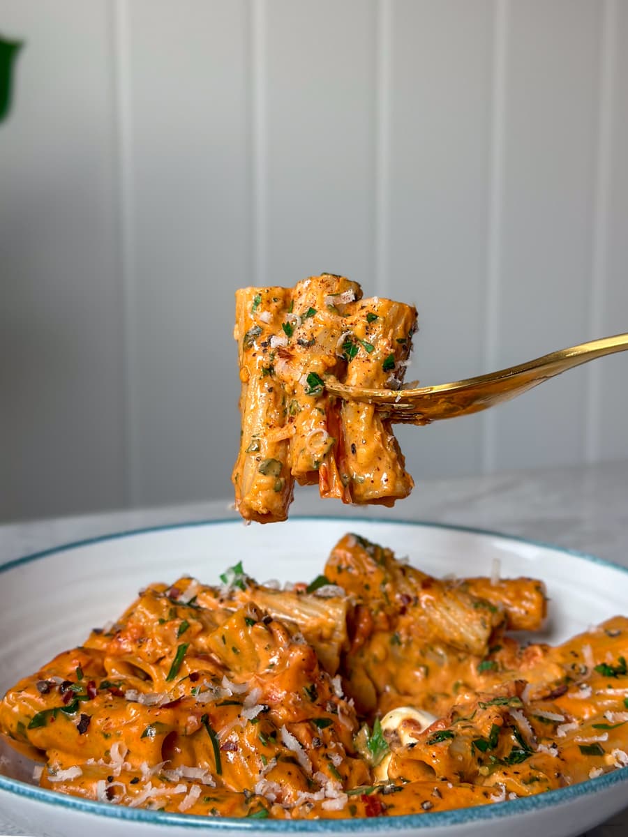 Creamy tomato garlic pasta in a bowl